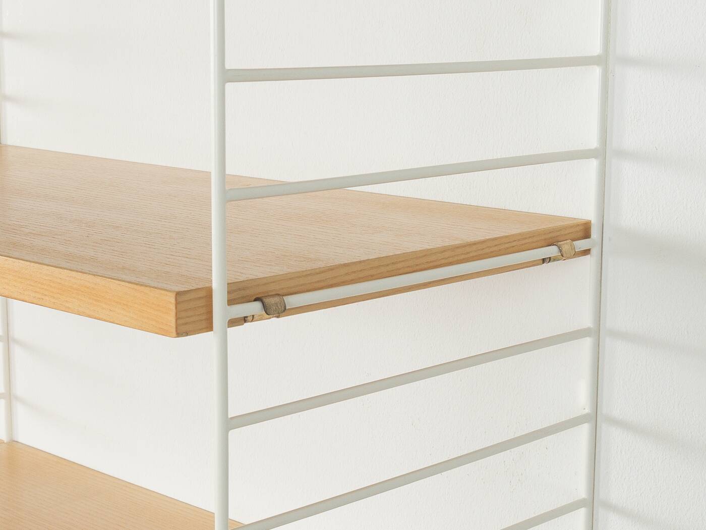 String shelf by Nils Strinning in ash veneer, 1949