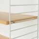 String shelf by Nils Strinning in ash veneer, 1949