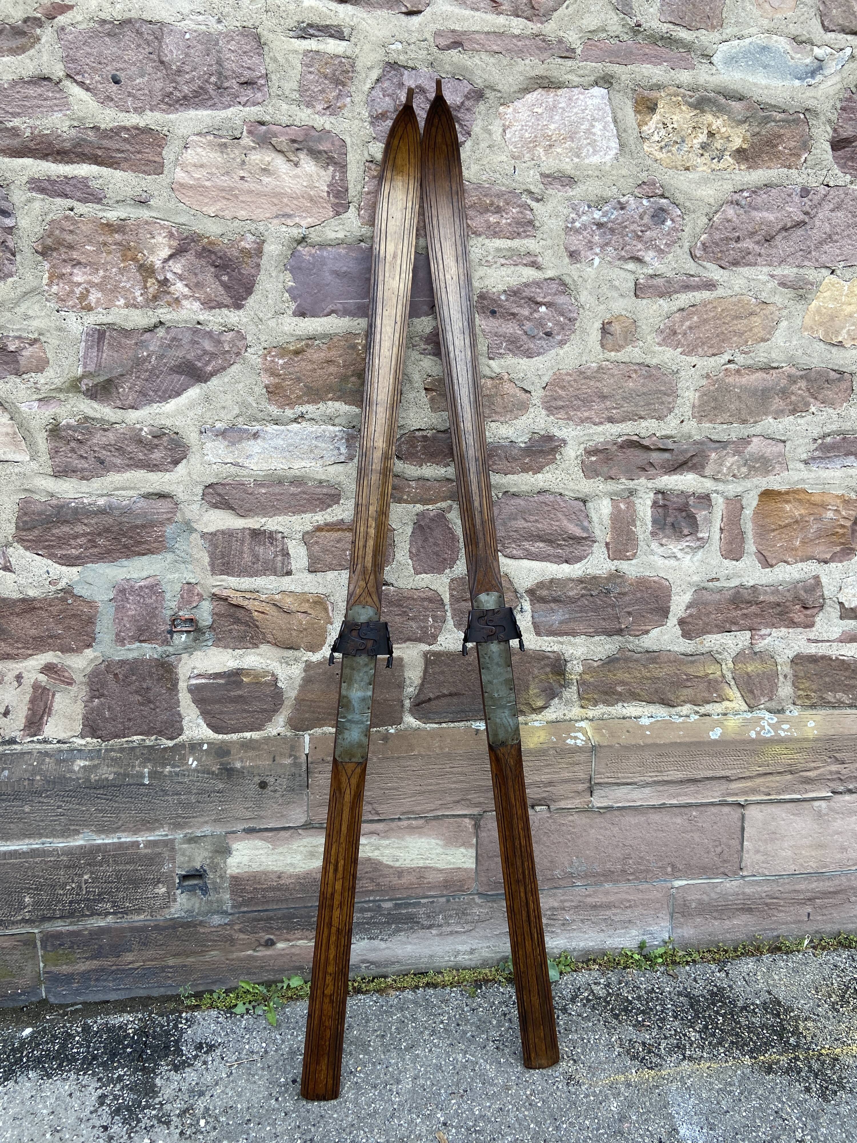 Pair of vintage wooden skis 1900-1920 mountain sport alsace chalet alps