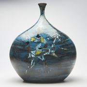 Large blue vase with ceramic rider by Jean de Lespinasse