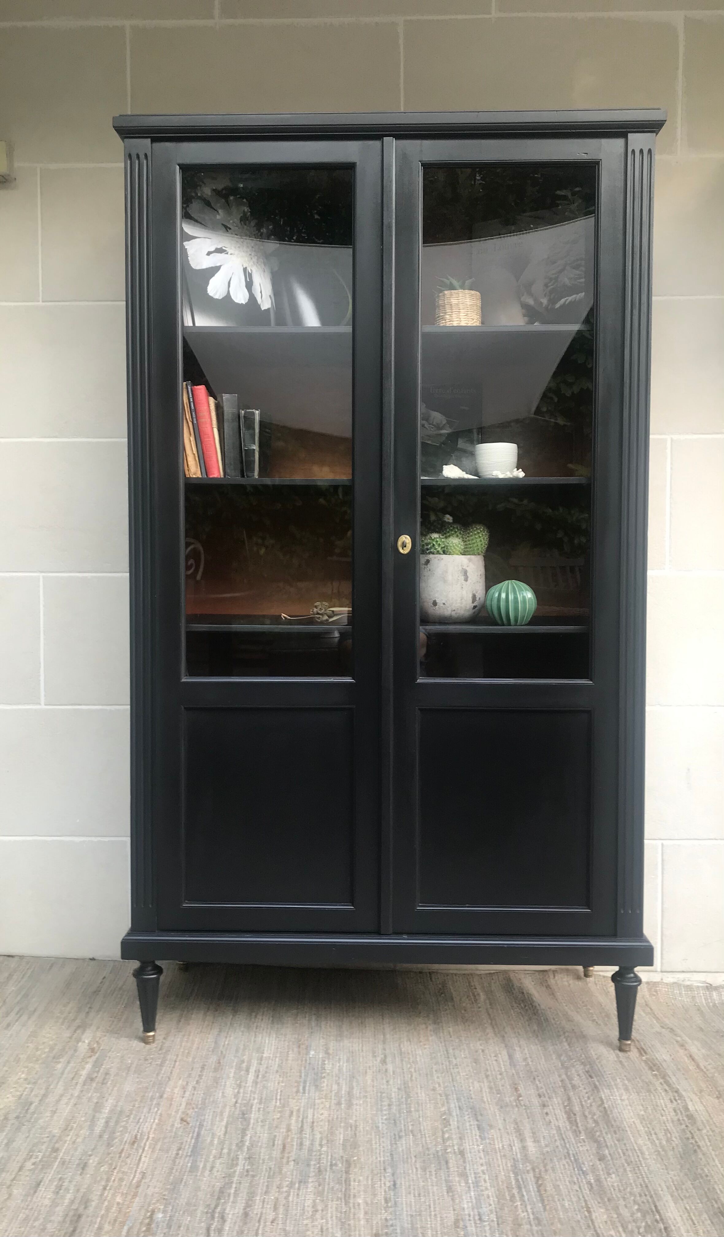 Showcase cabinet of curiosities black and wood