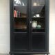 Showcase cabinet of curiosities black and wood