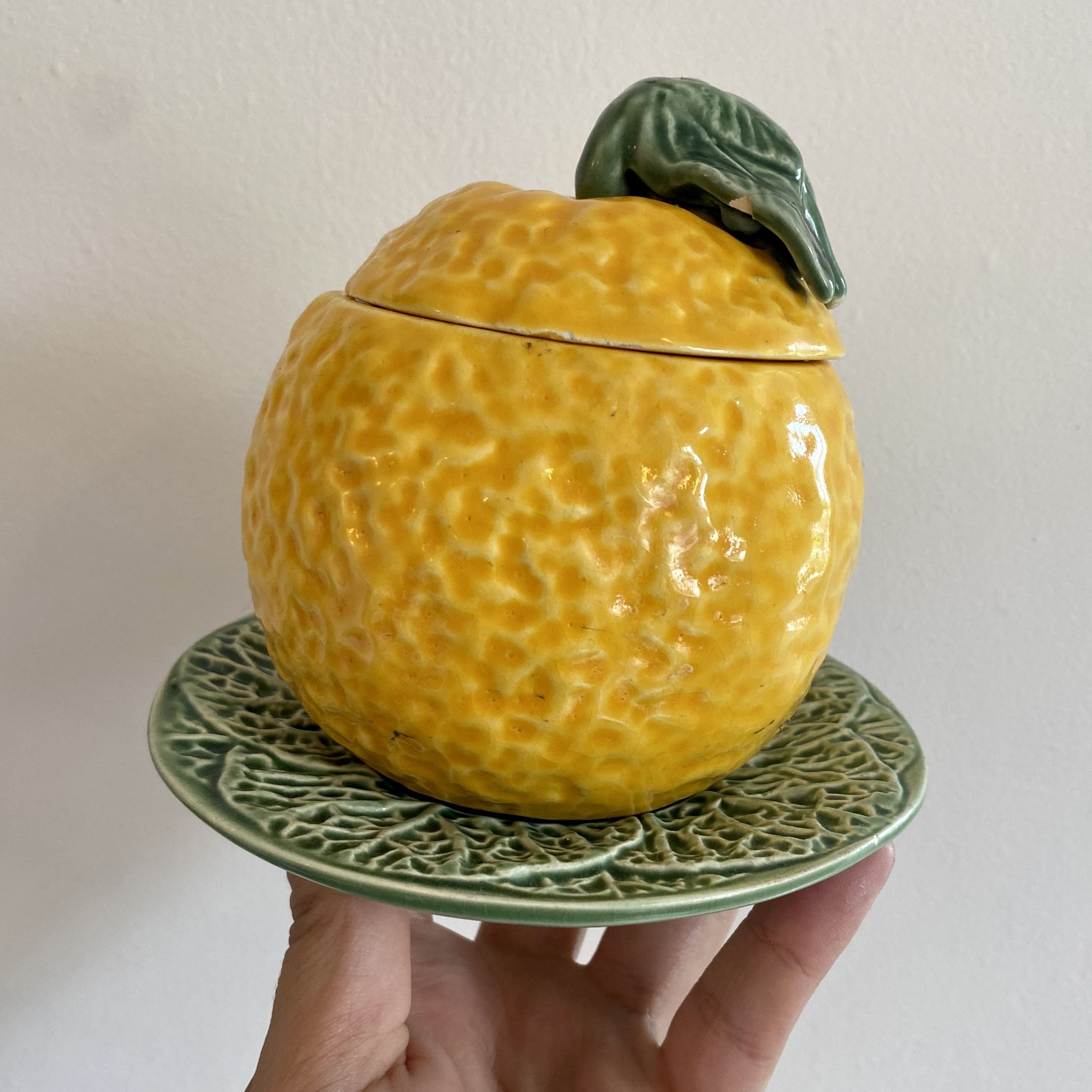 Set of ceramic fruits, a strawberry decanter and two lemon and pineapple jam jars