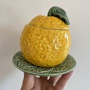 Set of ceramic fruits, a strawberry decanter and two lemon and pineapple jam jars