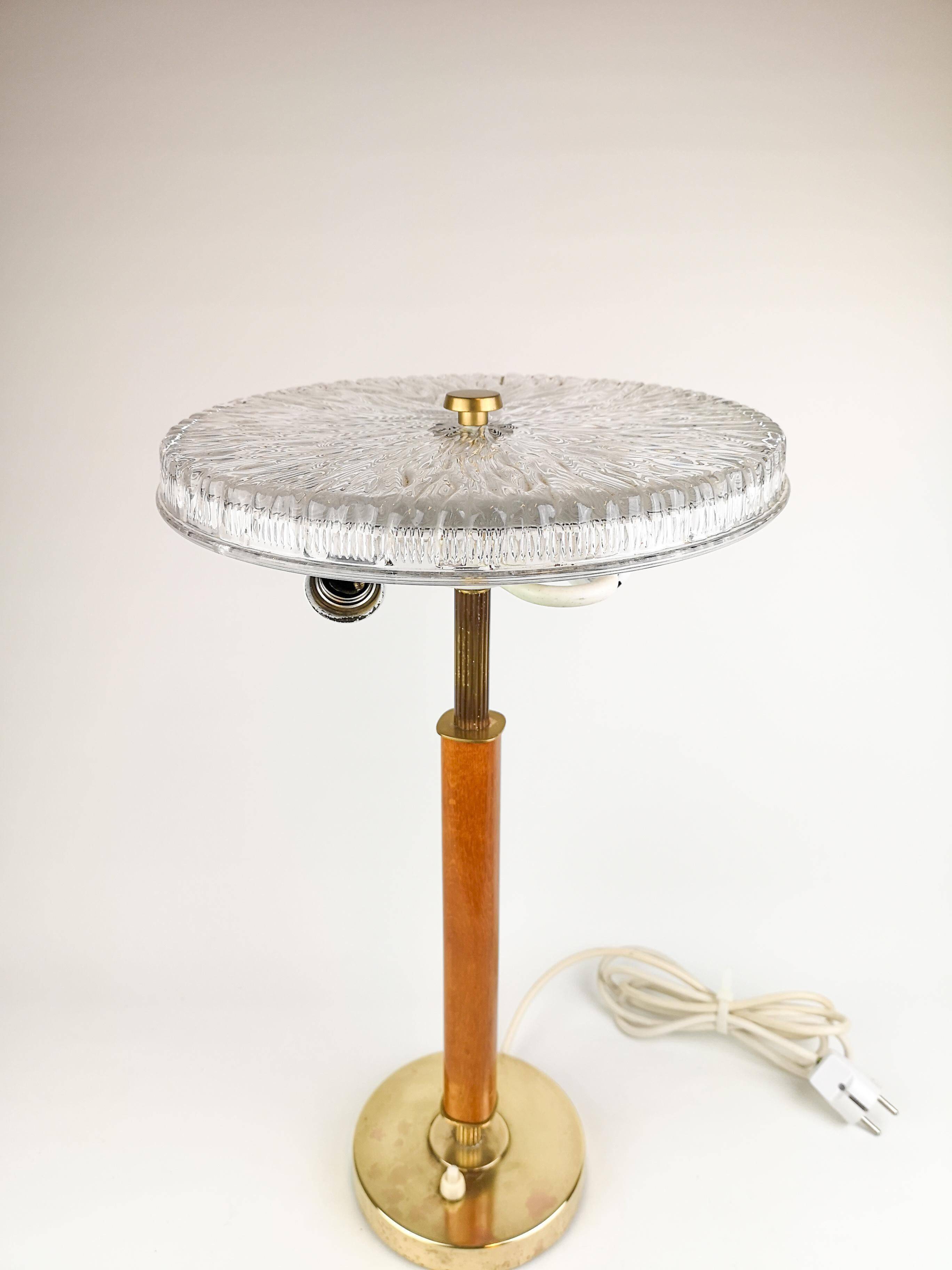 Mid-century Swedish table lamp in brass, crystal, and wood by Boréns.