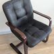 Pair of vintage cantilever armchairs in rosewood veneer.
