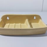 Pale yellow ceramic soap dish