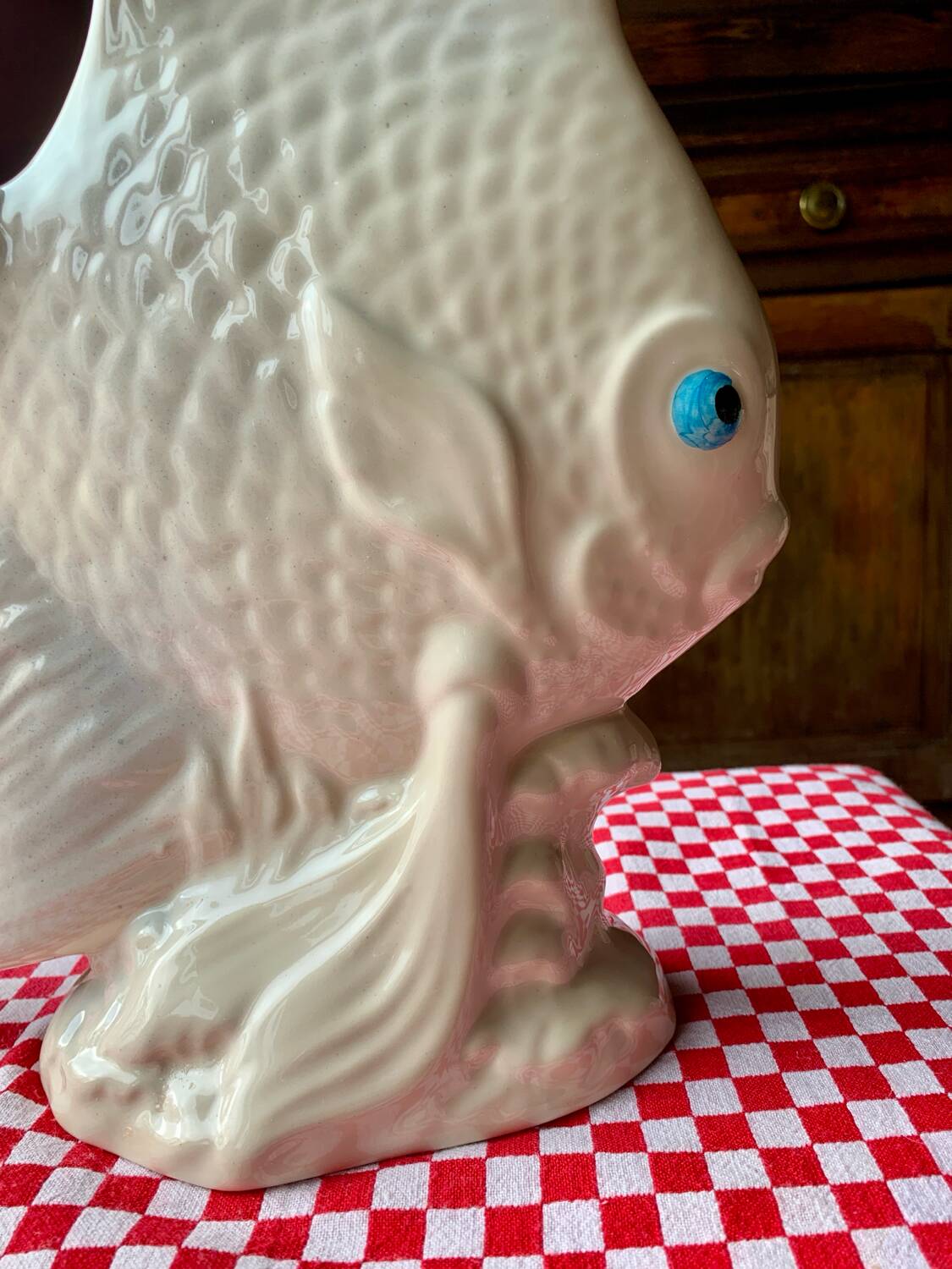 Large white ceramic fish to place.