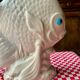 Large white ceramic fish to place.