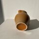 Pitcher in light beige sandstone