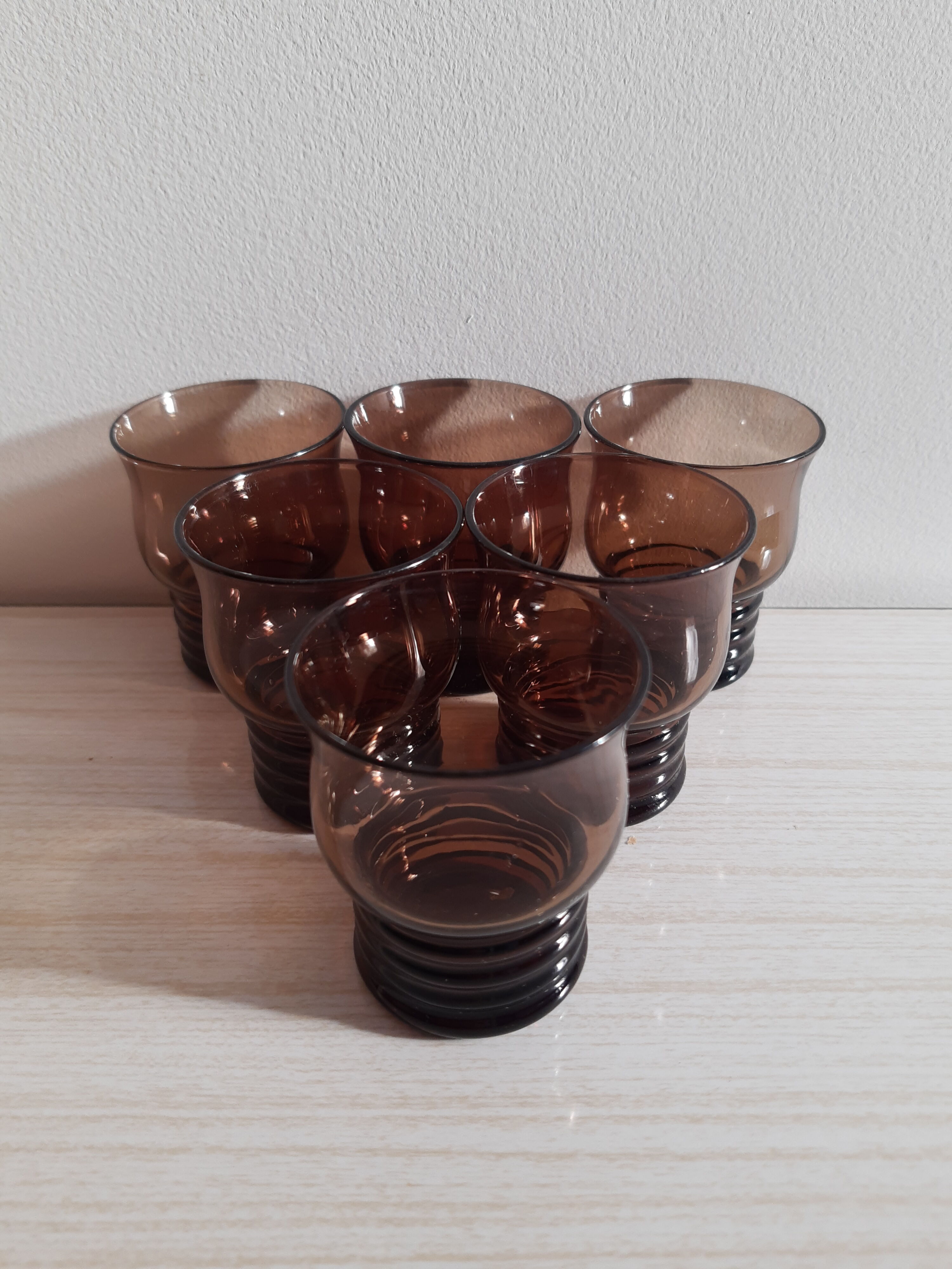 Glasses with vintage liqueur black smoked glass