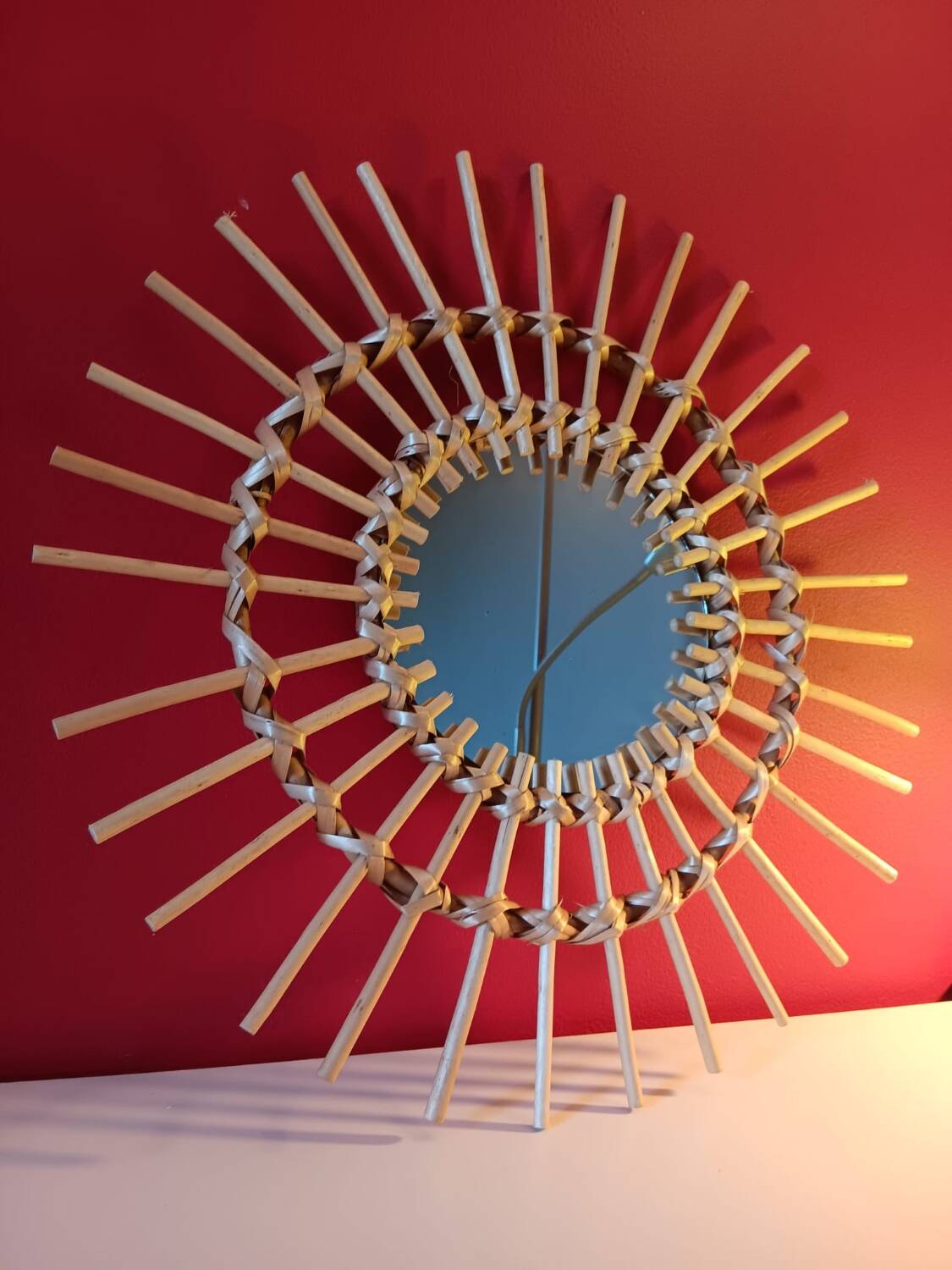 Vintage bohemian woven rattan sun mirror