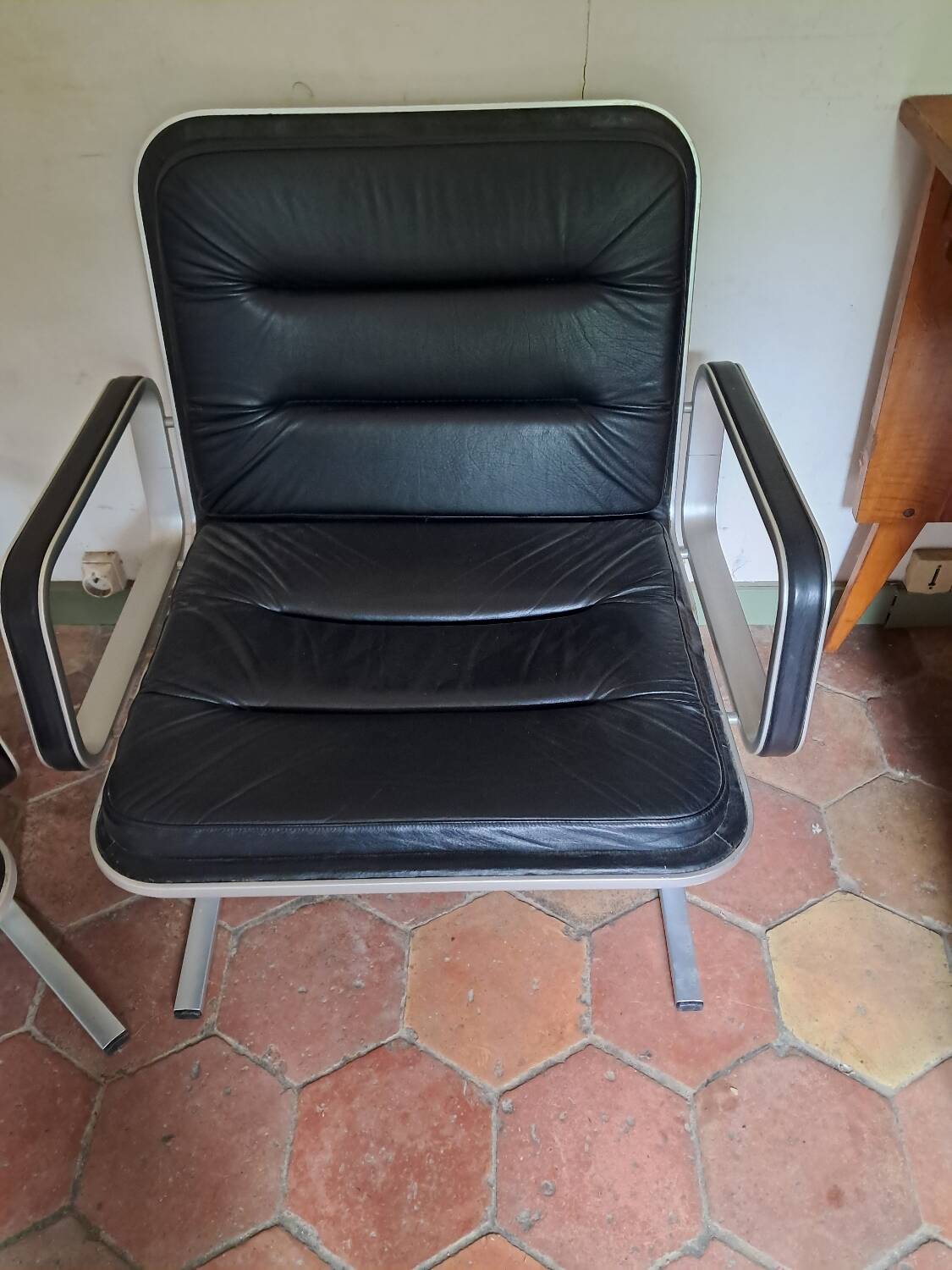 Pair of leather and aluminum armchairs