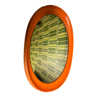 Orange oval mirror