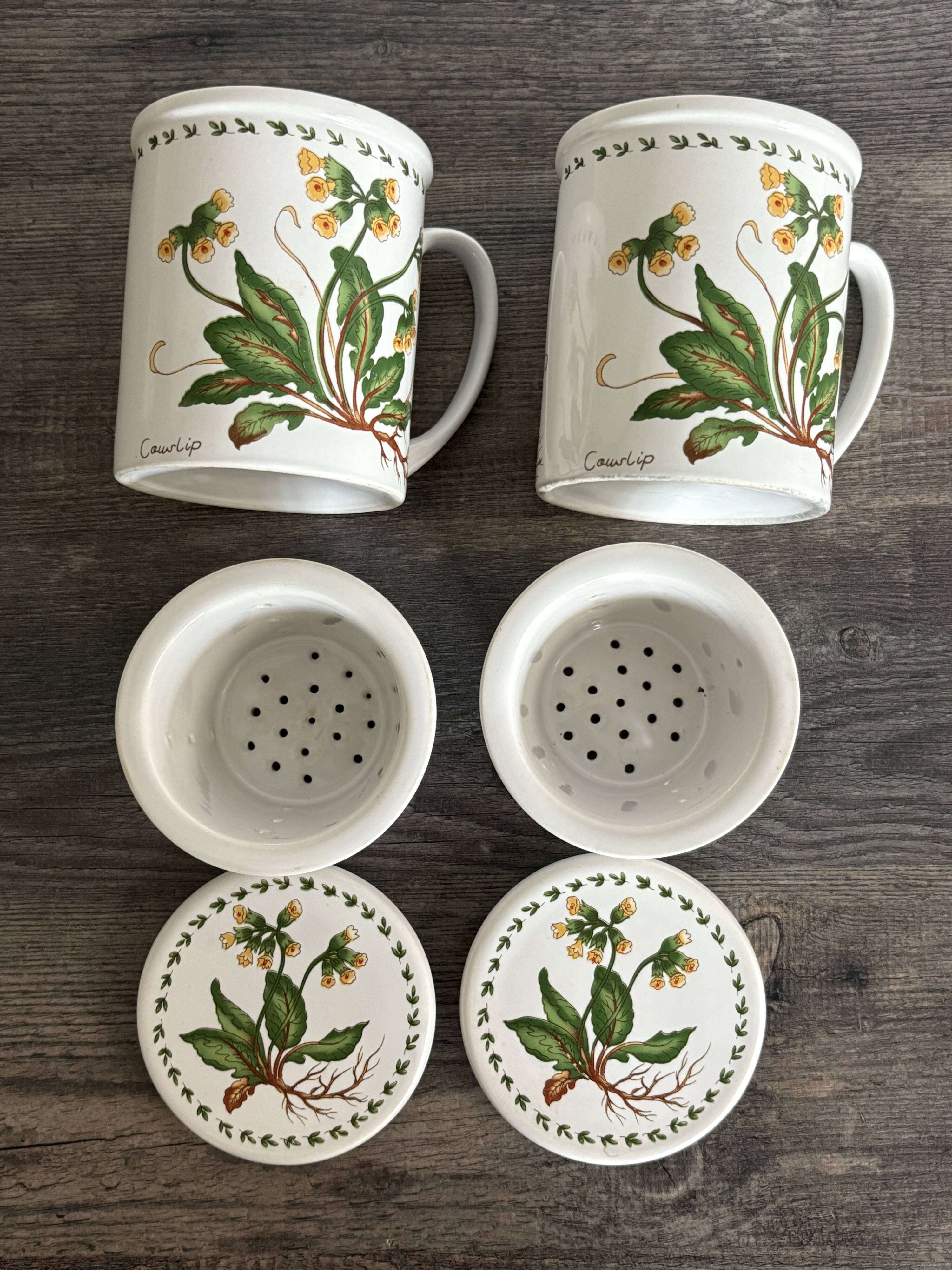 Pair of vintage infusion mugs.