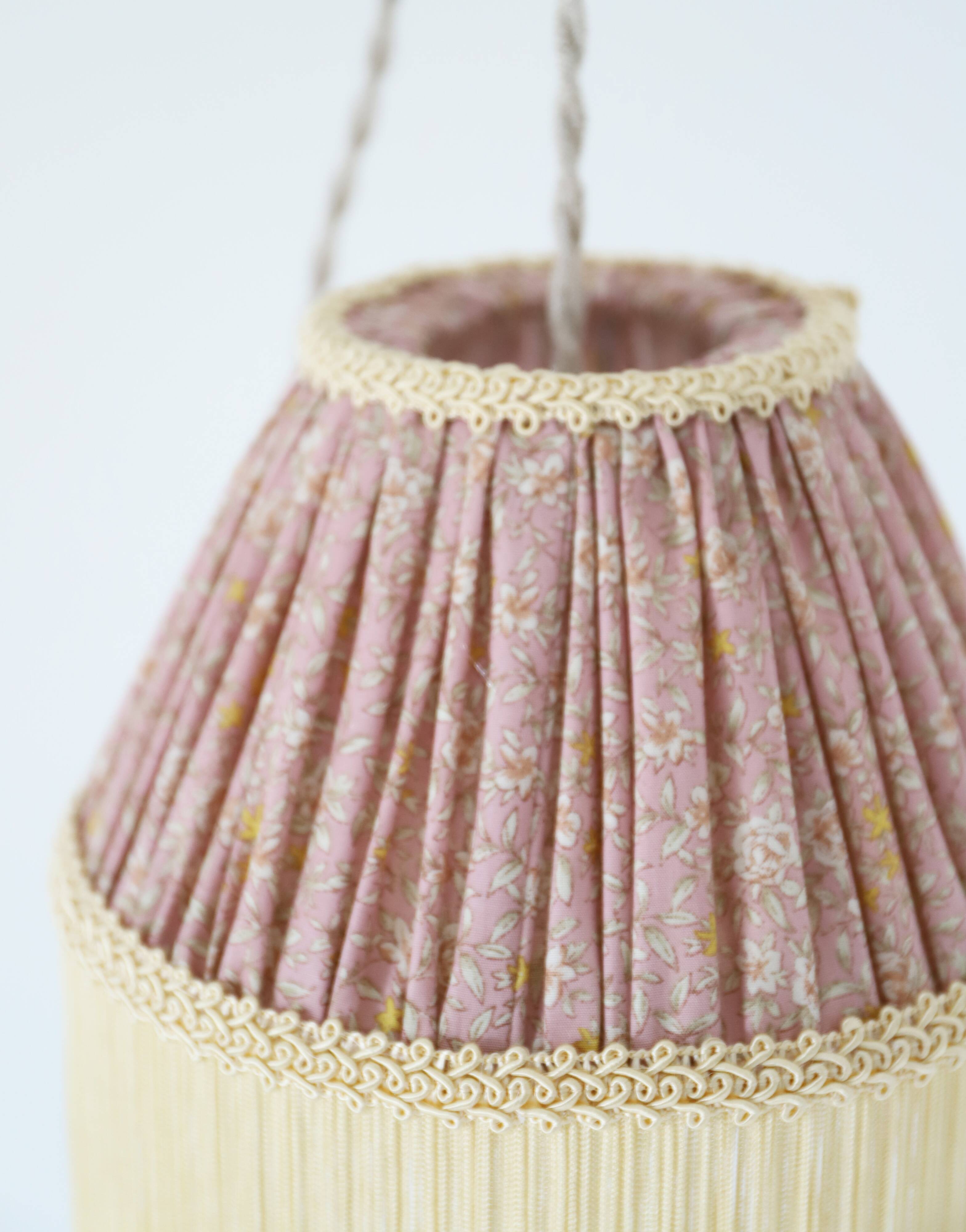 Small floral portable lamp with fringed finish