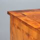 Neoclassical commode in walnut and burl.