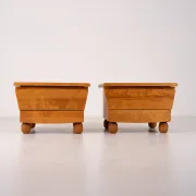 Pair of wooden bedside tables with rounded feet