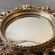 Vintage convex witch mirror – carved gilded wood – 1960s