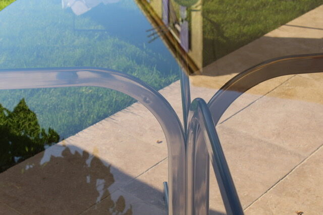 Oval glass and stainless steel table 70s