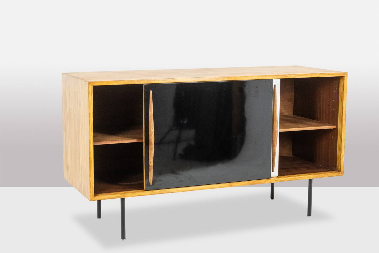 Low ash sideboard with sliding doors. 1960s.