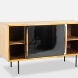 Low ash sideboard with sliding doors. 1960s.