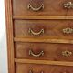 Antique marquetry commode in the Louis XVI style.