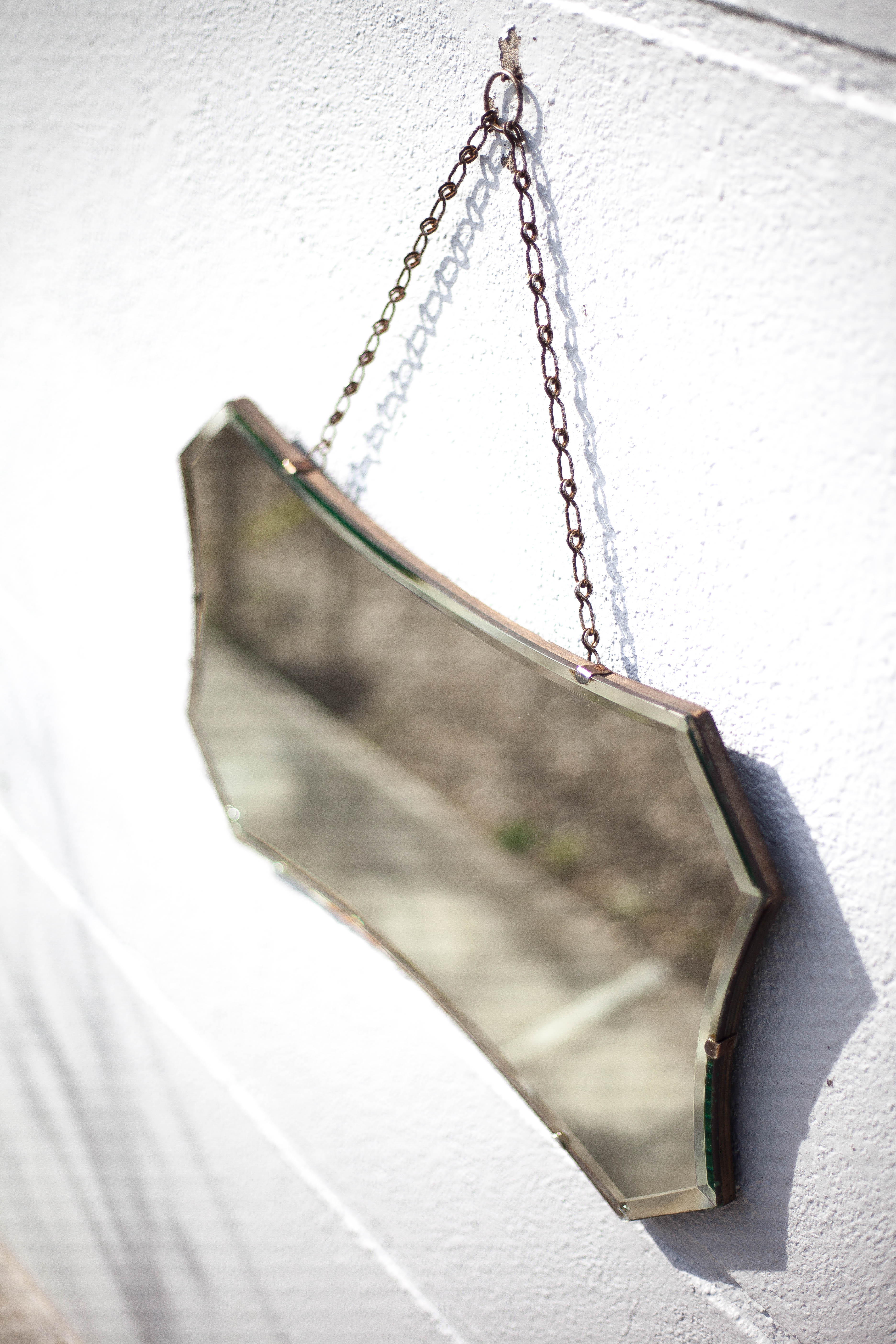 Vintage wall mirror with beveled chain