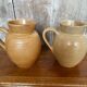 Pair antique cnp village beige & cream stoneware pitchers vintage