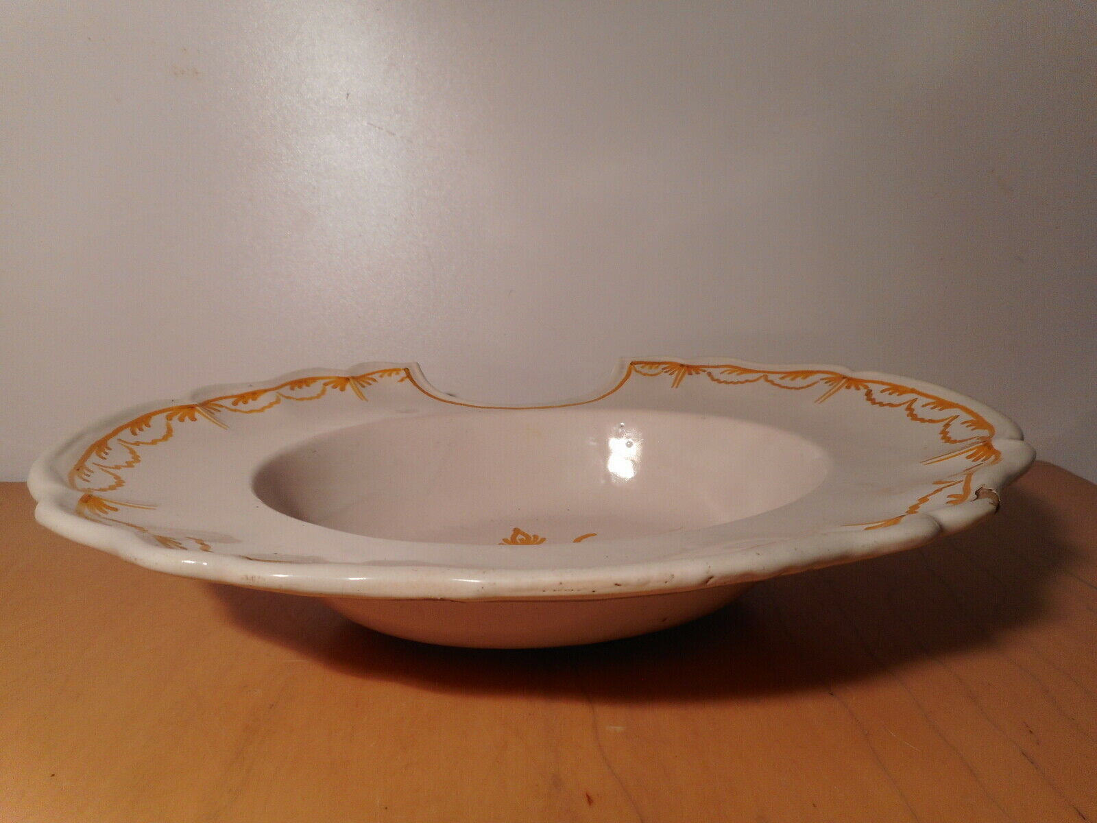 Old beard dish in faience of the south of the France 18 century in yellow camaieu