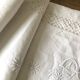 Old embroidered cloth, monograms and lace