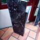 White veined black marble fireplace