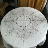 Round off-white tablecloth embroidered with grey flowers with 8 matching napkins - festive table