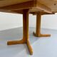 Antique round Scandinavian dining table from the 70s with 1 solid wood extension
