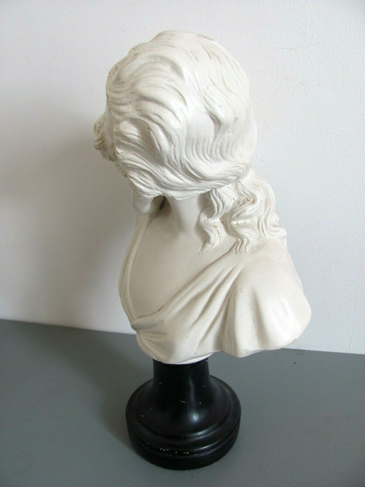 Sculpture in plaster, young mother and child