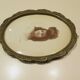 Old wall frame in carved wood and gilded stucco, oval