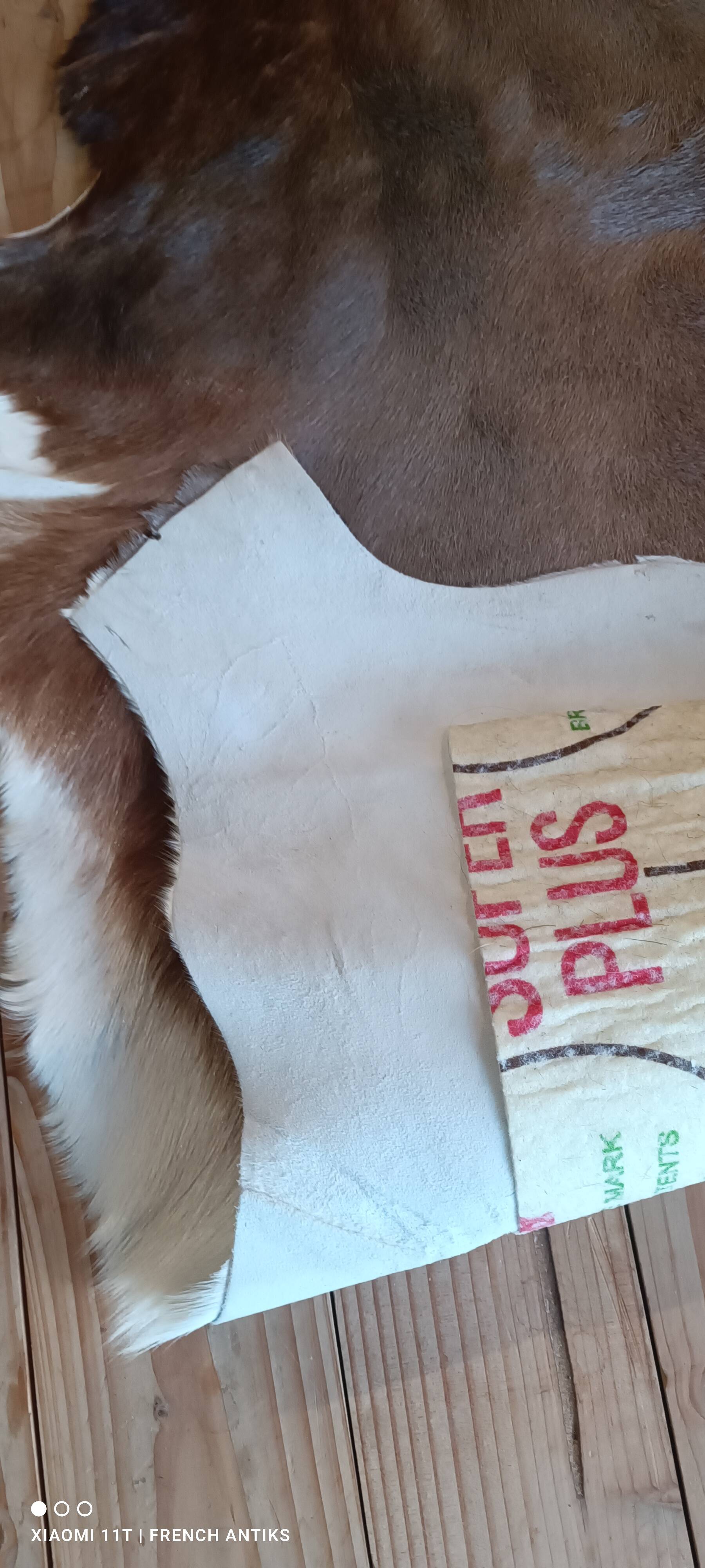 Cowhide rug, vintage from the 1980s. Handmade, made by me.