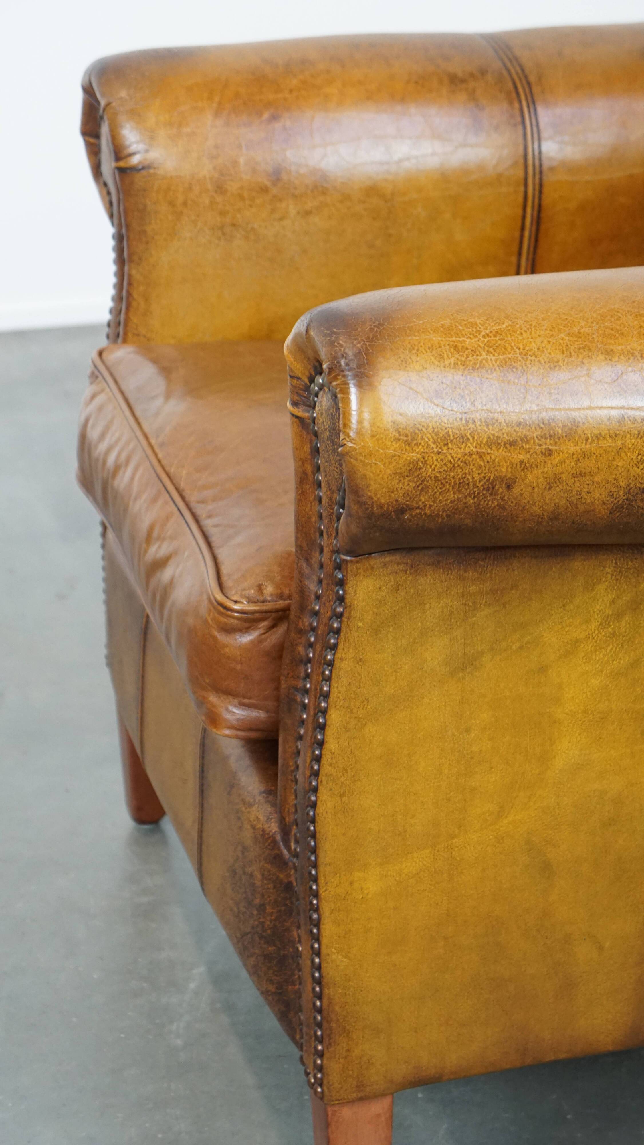 Cowhide Leather Armchair with Deep Warm Colors