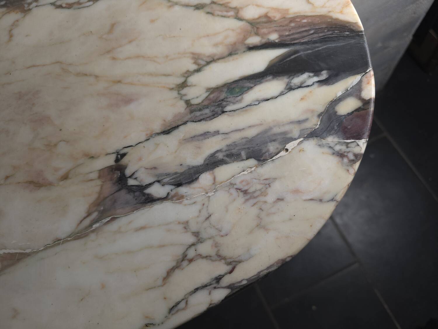 Louis XVI style console in gilded wood with a marble top.