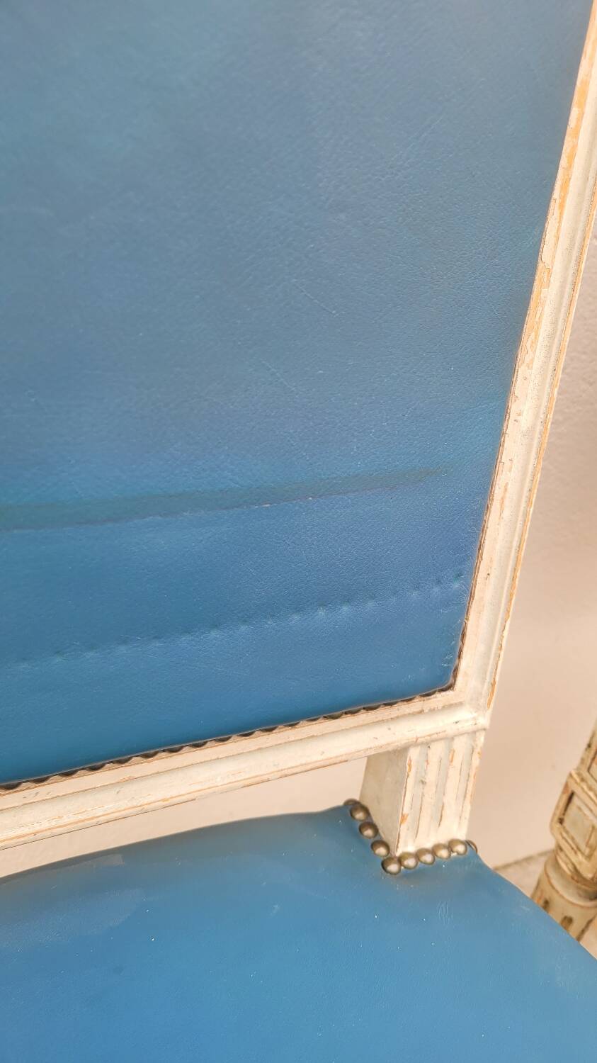 Pair of antique Louis XVI style chairs with patina