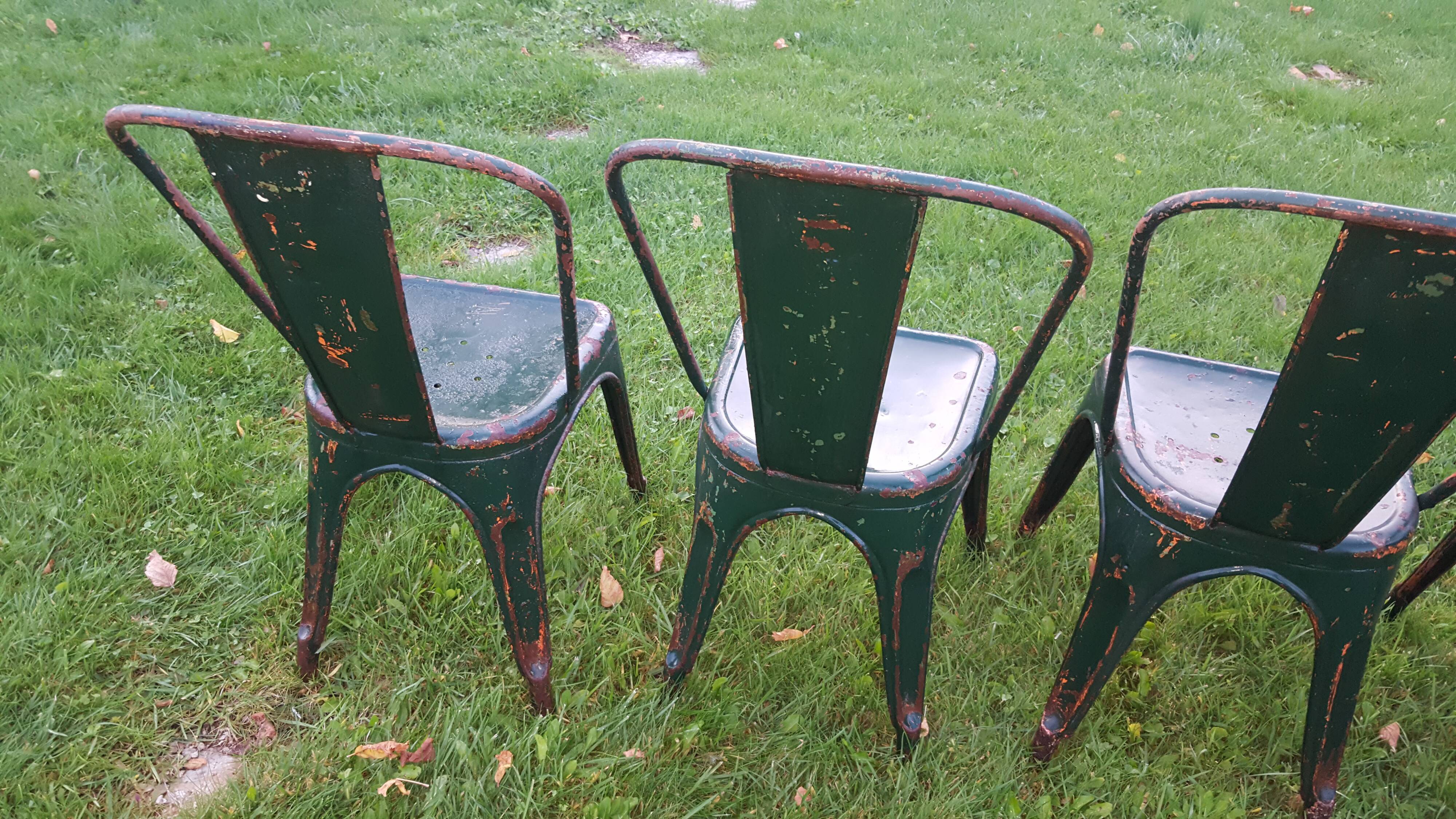 4 Green chaises Tolix industrial, first model (background)