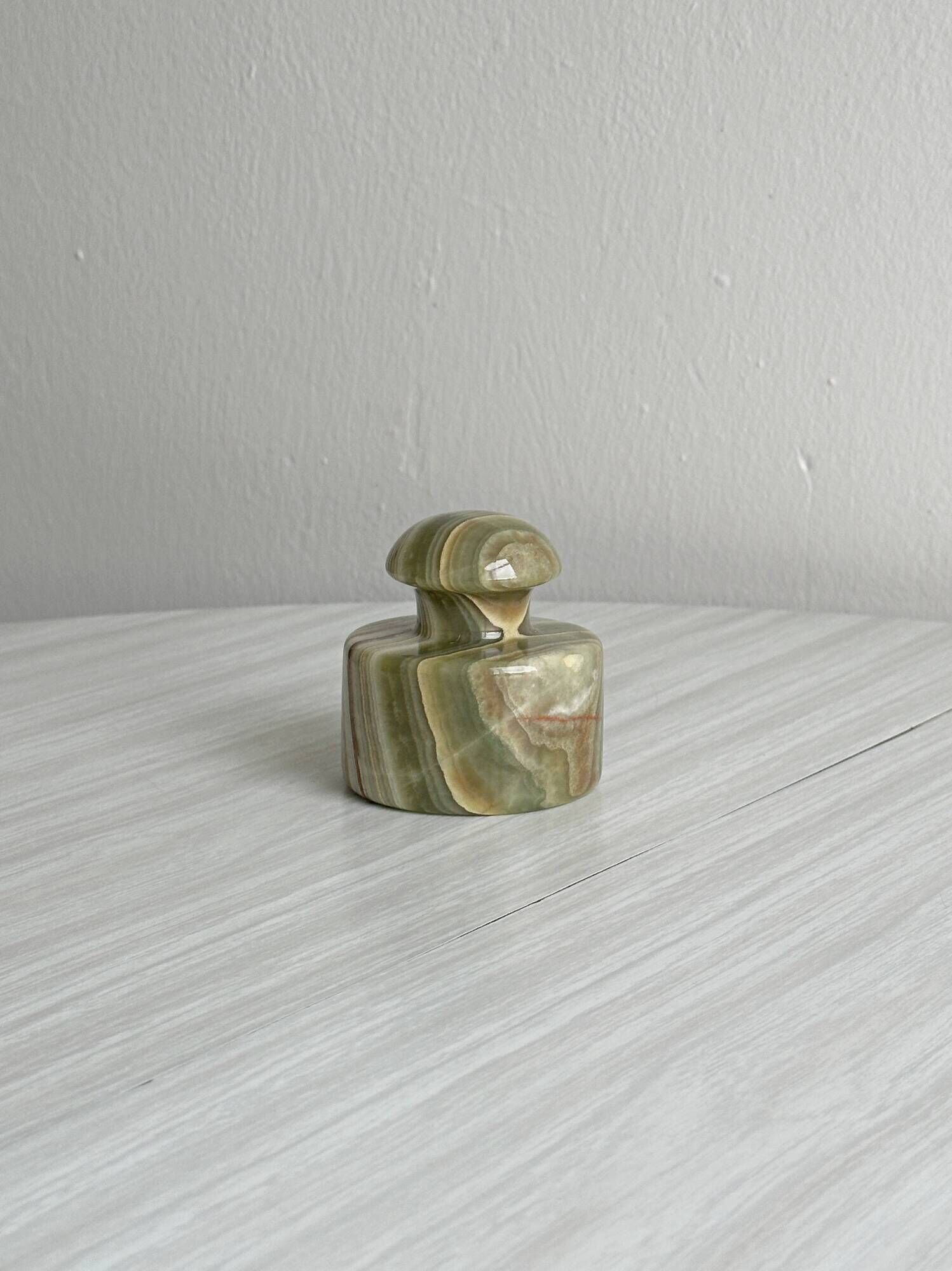 Green veined stone paperweight