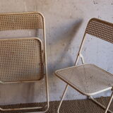 Two metal tanned folding chairs