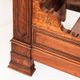 Bed made of solid walnut with marquetry details. France, 1930s.
