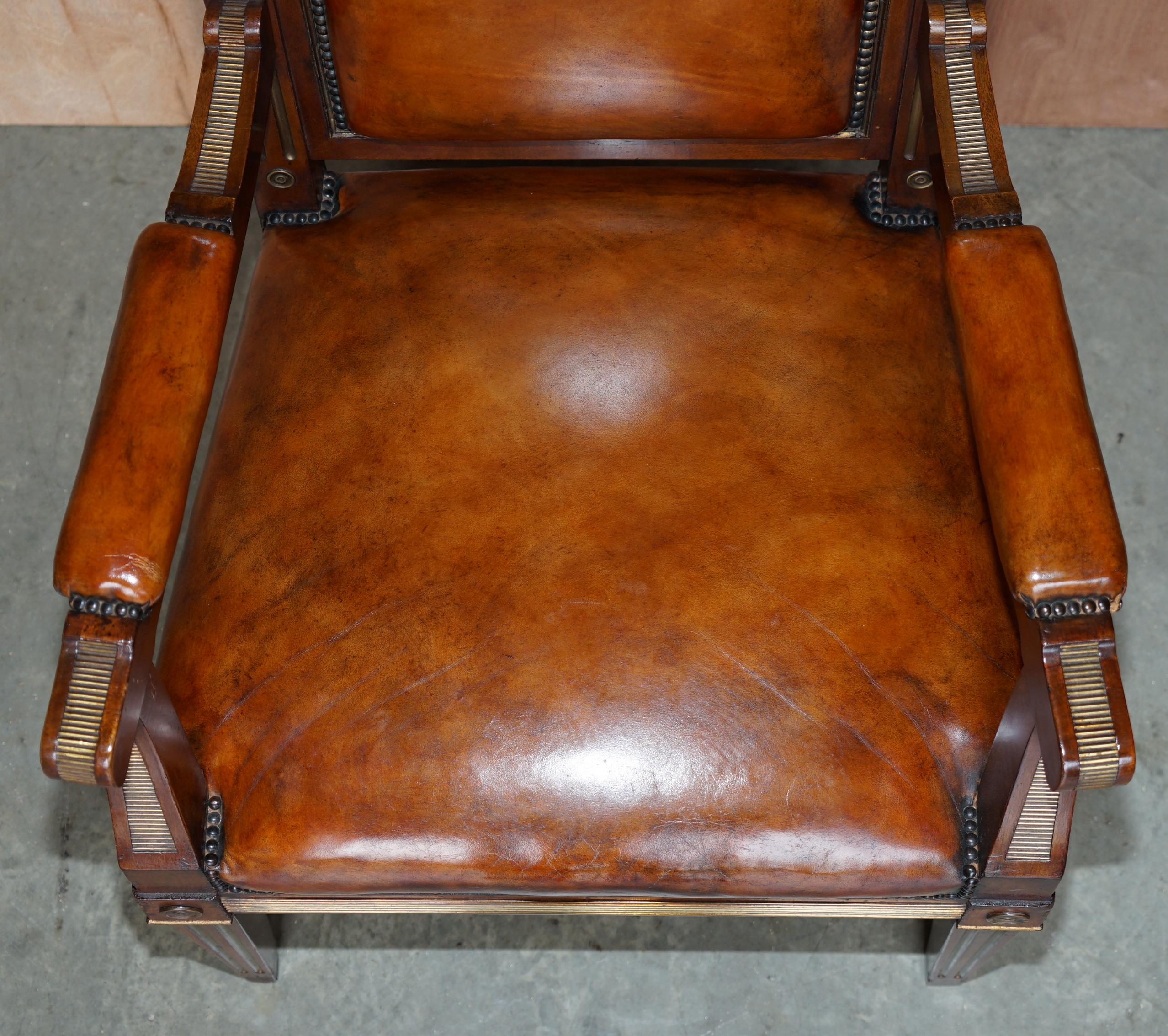 Restored antique Russian hardwood partner desk and leather armchair.