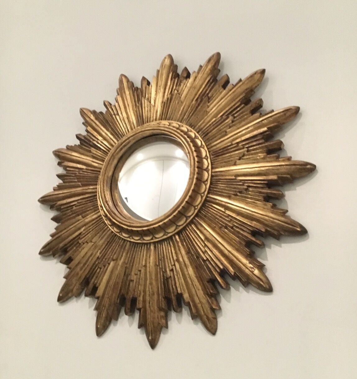 Mirror convex Sun resin.