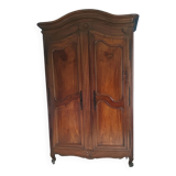 Large Louis XV style gendarme's hat-shaped wardrobe