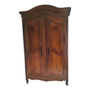 Large Louis XV style gendarme's hat-shaped wardrobe