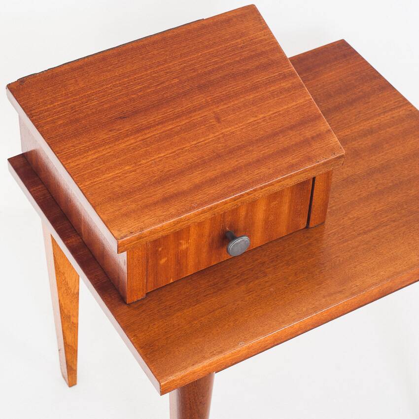 Vintage bedside table. Varnished wood. France, 1960s.