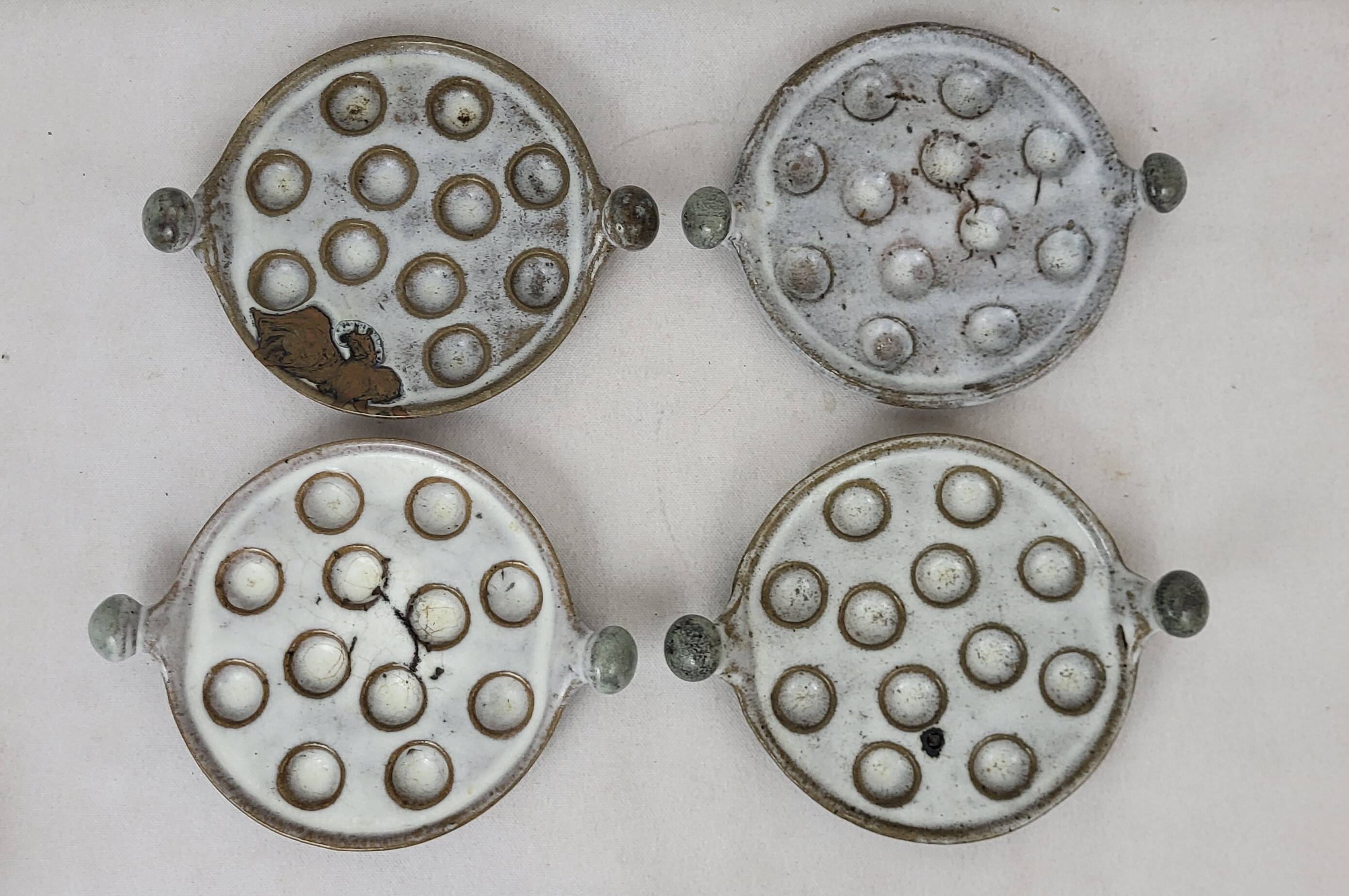 4 stoneware snail plates